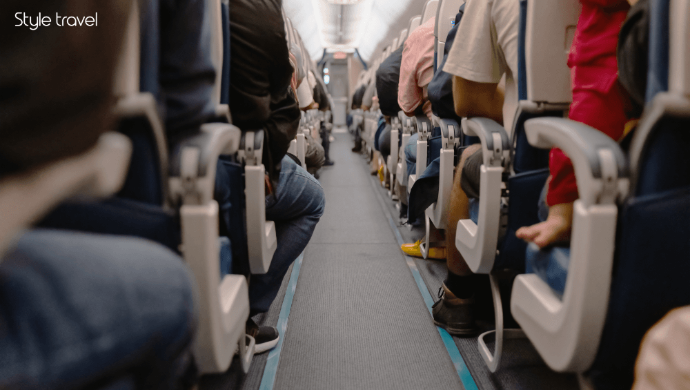 Choose a seat near the front of the plane