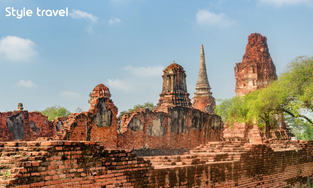 Ancient brick towers and temple ruins at Wat Mahathat in Ayutthaya