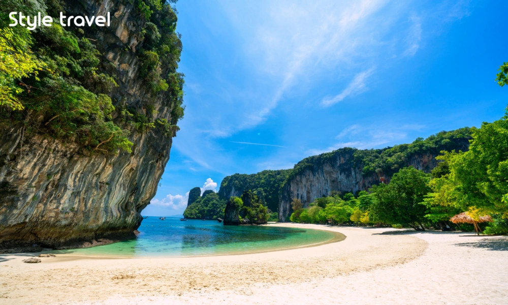 Hong Island lagoon surrounded by forested limestone cliffs