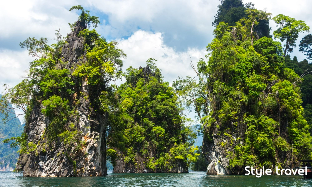 Khao Sam Kloe limestone formations rising above Cheow Lan Lake
