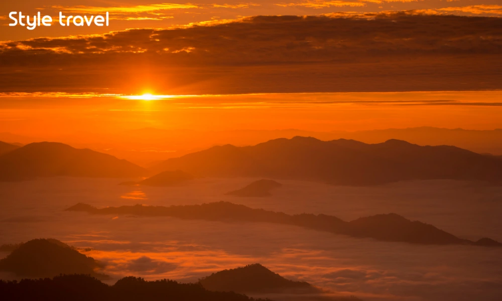 Mountain ridges beneath the early morning sky at Phu Chi Fa