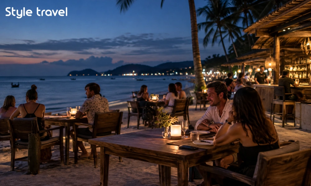 Chaweng beach bar at dusk with tables overlooking the sea in Koh Samui