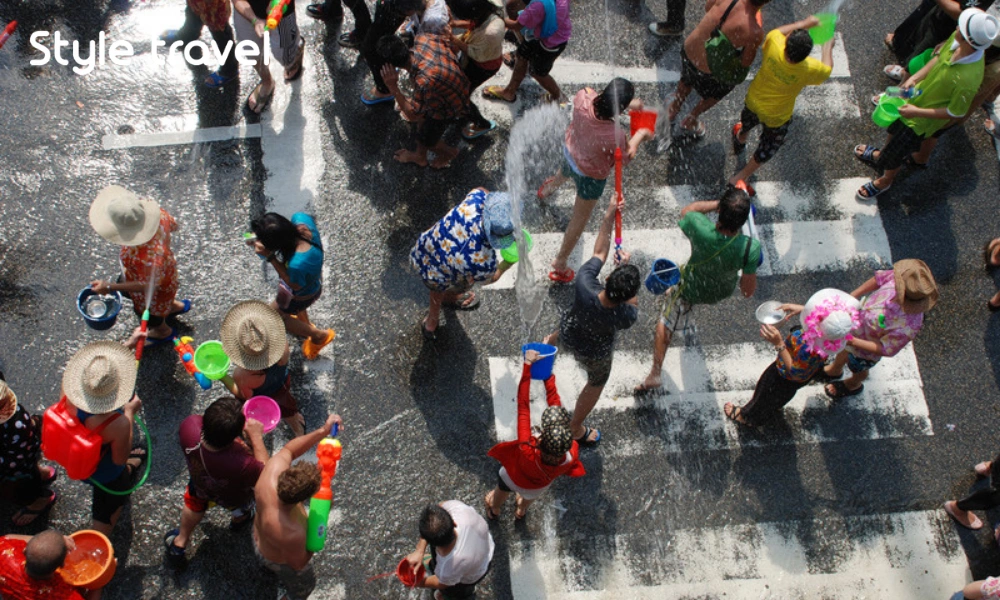 Visitors joining street water fights at the Thailand water festival
